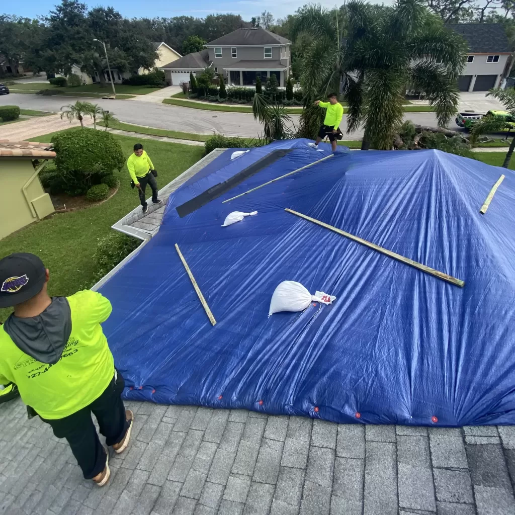 Tarping a roof